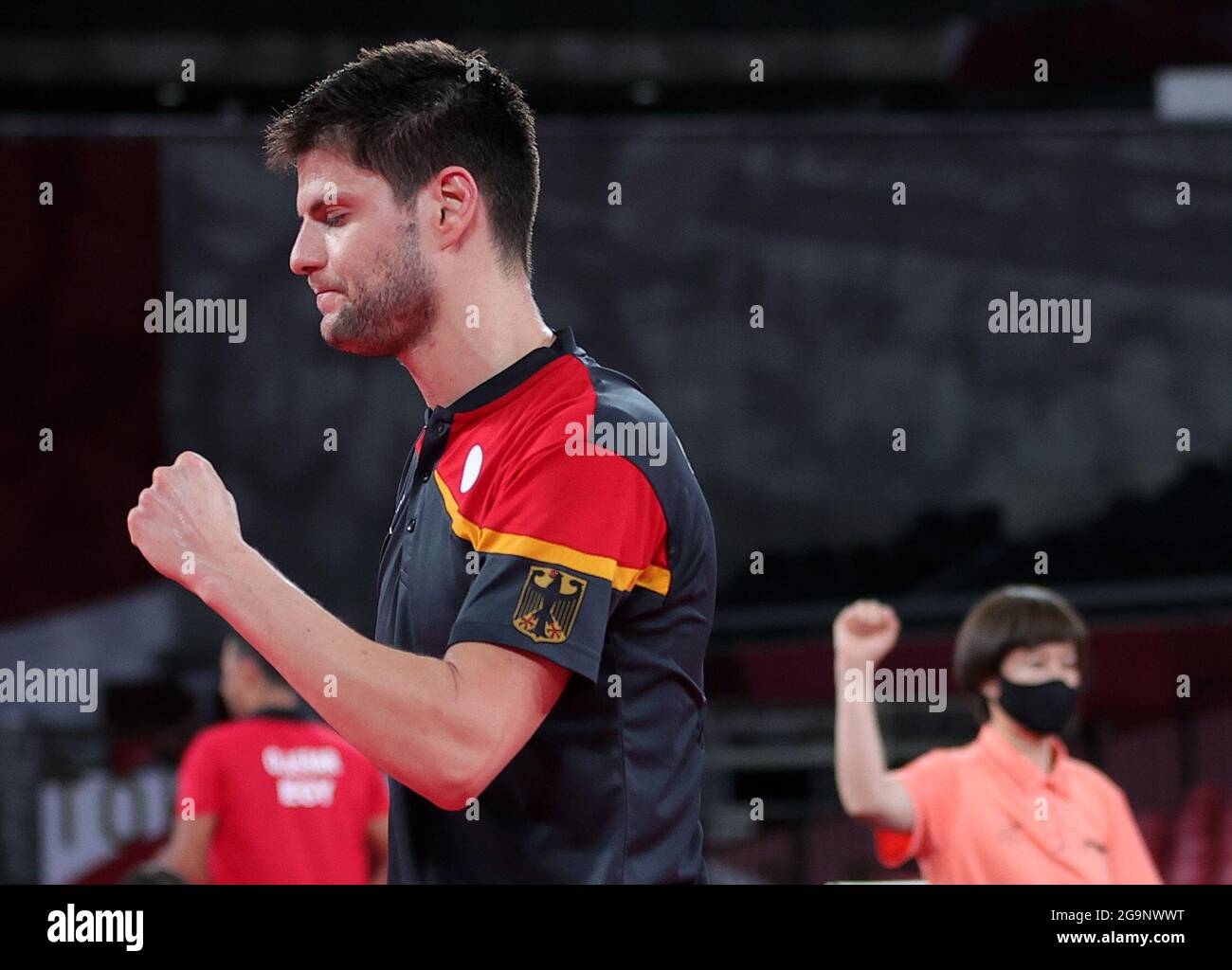 Tokyo, Japan. 27th July, 2021. Dimitrij Ovtcharov of Germany celebrates after winning the table tennis men's singles round of 16 match against Koki Niwa of Japan at the Tokyo 2020 Olympic Games in Tokyo, Japan, July 27, 2021. Credit: Wang Dongzhen/Xinhua/Alamy Live News Stock Photo