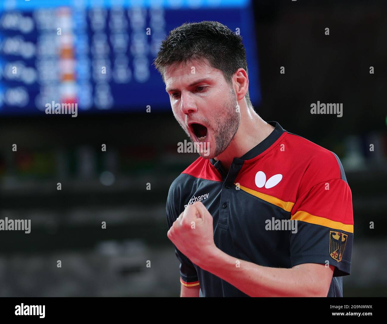 Tokyo, Japan. 27th July, 2021. Dimitrij Ovtcharov of Germany celebrates after scoring during the table tennis men's singles round of 16 match against Koki Niwa of Japan at the Tokyo 2020 Olympic Games in Tokyo, Japan, July 27, 2021. Credit: Wang Dongzhen/Xinhua/Alamy Live News Stock Photo