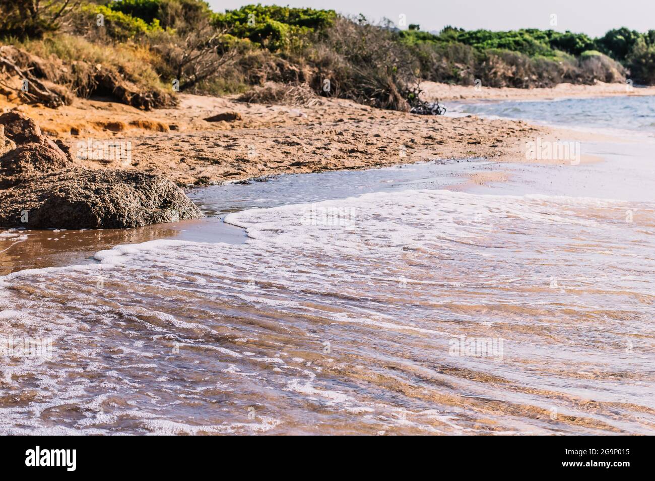 Deserted beaches with rocks and yellow sand.beautiful sea.Sardinia Stock Photo