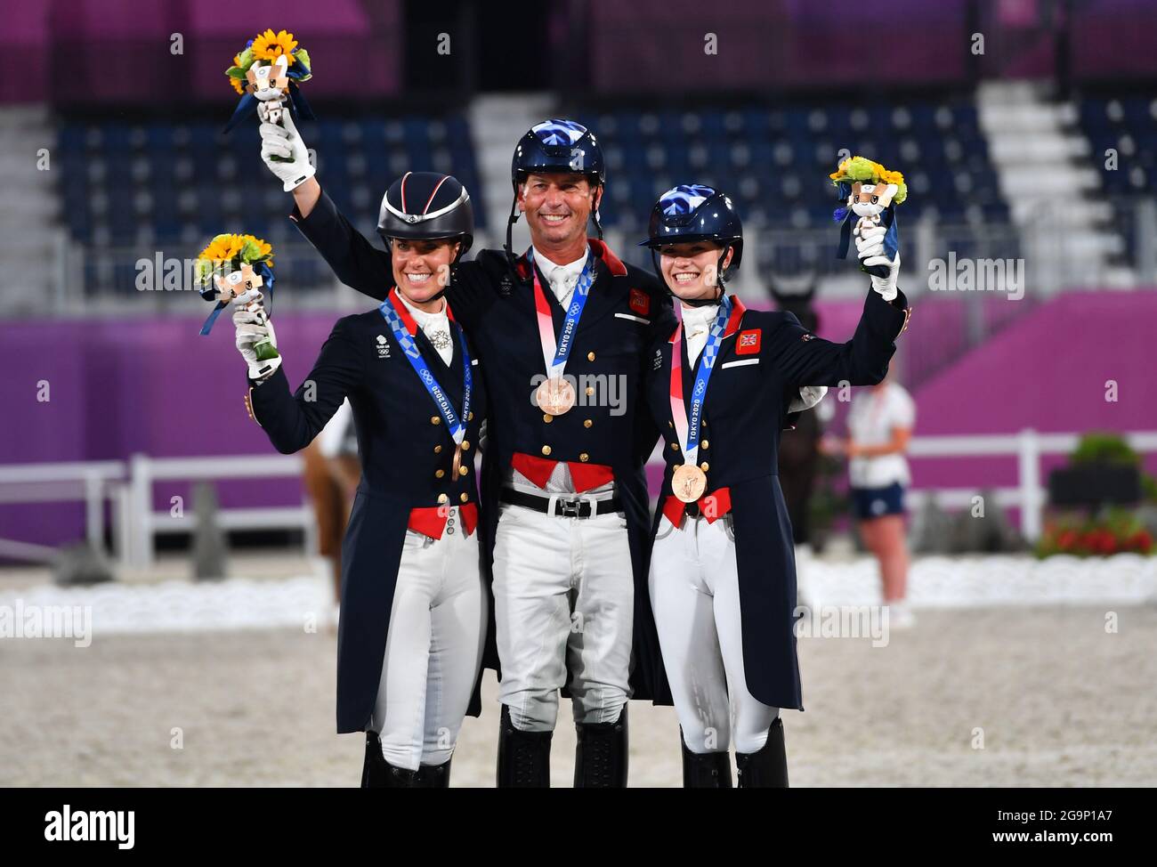 TOKYO, July 27, 2021 (Xinhua) -- Bronze medalists team Great Britain celebrate during the awarding ceremony of the equestrian dressage team final at the Tokyo 2020 Olympic Games in Tokyo, Japan, July 27, 2021. (Xinhua/Zhu Zheng) Stock Photo