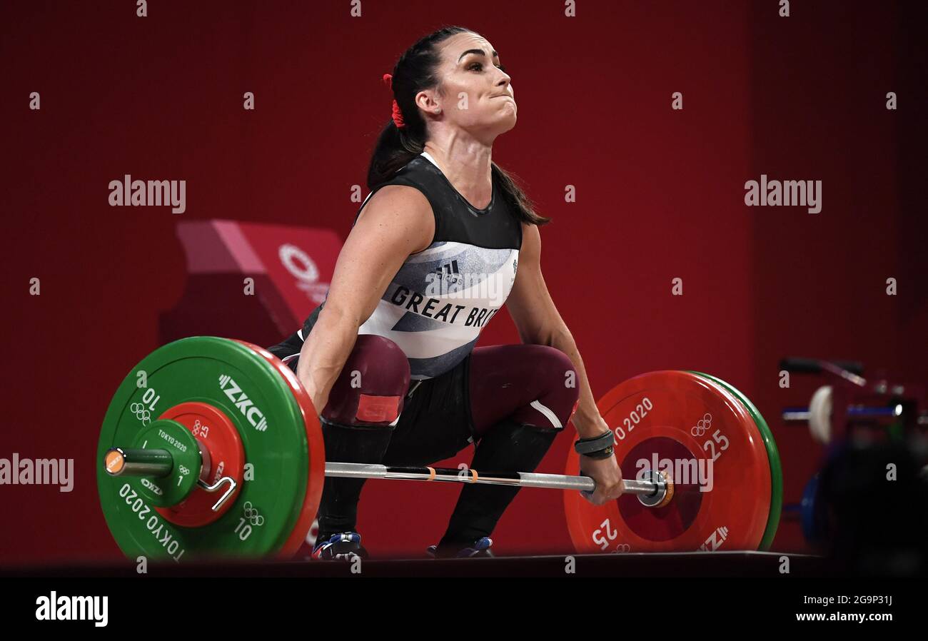 Tokyo, Japan. 27th July, 2021. Great Britain's Sarah Davies summons her strength in her attempt to lift 97kg in the Snatch during the Women's 64kg weightlifting competition at the Tokyo 2020 Olympics, Tuesday, July 27, 2021, in Tokyo, Japan. Photo by Mike Theiler/UPI Credit: UPI/Alamy Live News Stock Photo