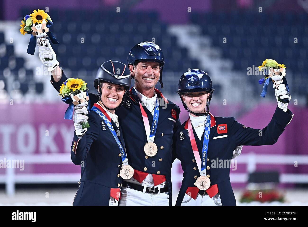 Tokyo, Japan. 27th July, 2021. Dressage Team. Grand Prix Special. Team Final. Equestrian Park. 1-1. 2Chome. Kamiyoga. Setagaya. Tokyo. Bronze medalists. (l to r) Charlotte Dujardin, Carl Hester and Charlotte Fry (GBR). Credit Garry Bowden/Sport in Pictures/Alamy live news Credit: Sport In Pictures/Alamy Live News Stock Photo