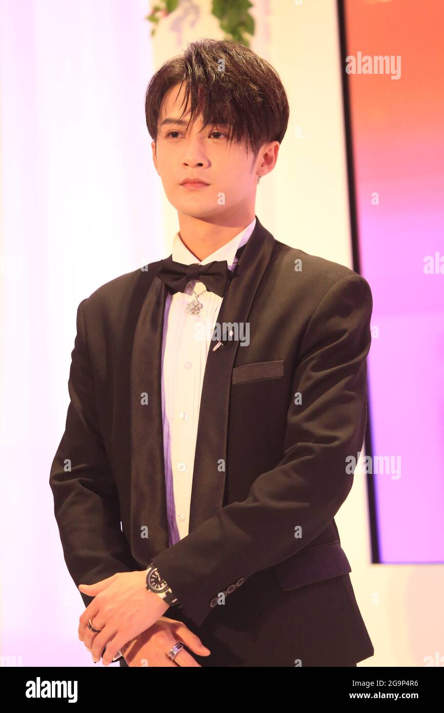 Chinese actor, singer, and dancer Tan Jianci, also known by his stage name  JC-T, stands for Bvlgari in Shanghai, 26 July 2021. (Photo by  ChinaImagesSipa USA Stock Photo - Alamy