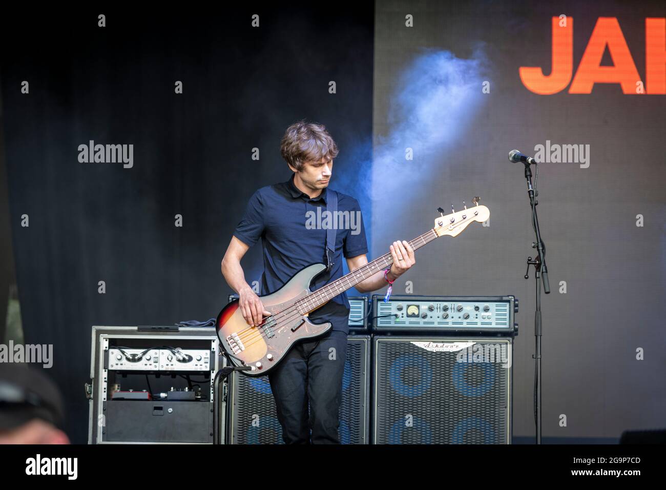 Tom Robertson bass player with the Jake Bugg band at Standon Calling music festival 2021 Hertfordshire UK Stock Photo
