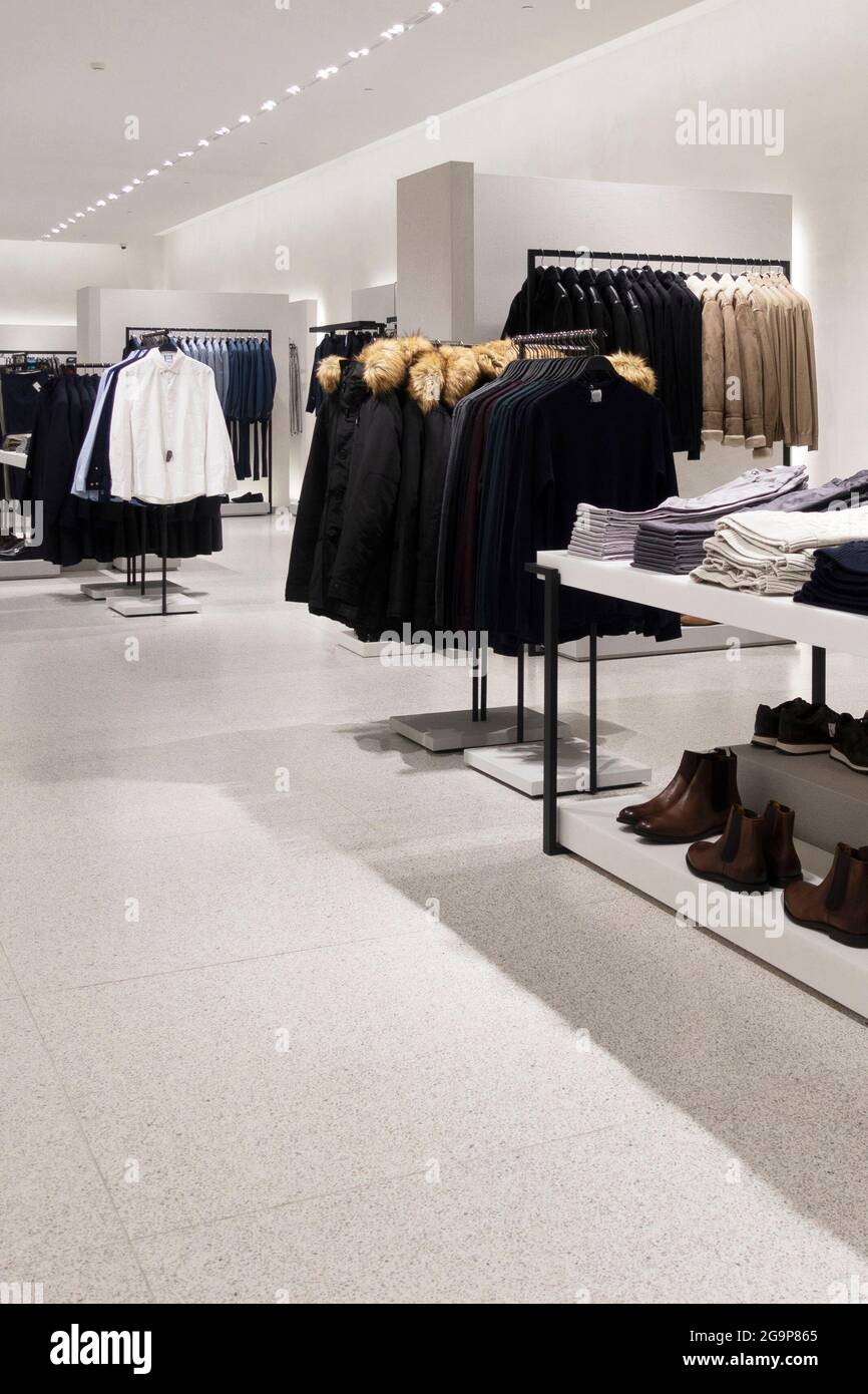 Empty modern fashionable brand interior of clothing store inside ...