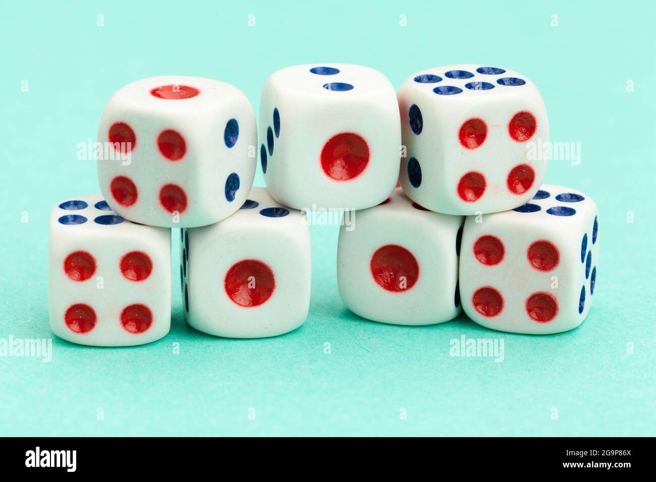 Gaming dices on blue background. Game concept. Stock Photo
