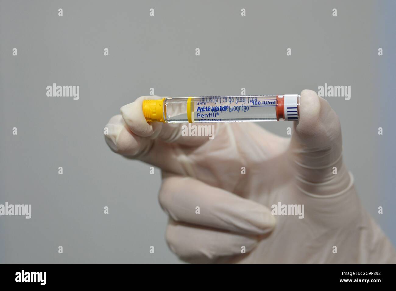 Actrapid human insulin rDNA penfill 100 IU solution for subcutaneous or intravenous injection in cartridge used in diabetic patients in IDDM patients Stock Photo