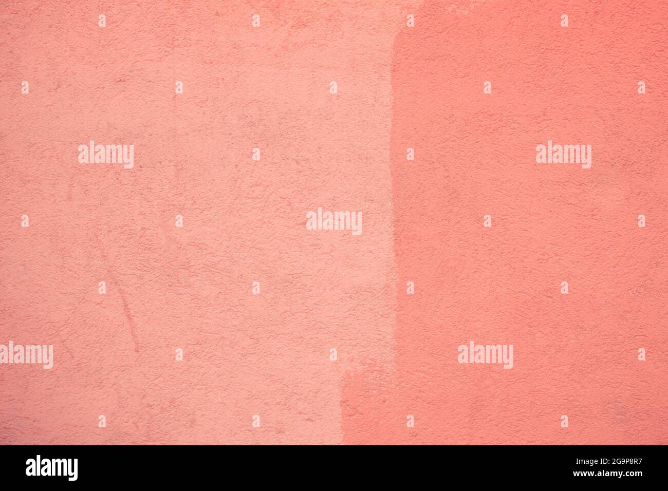 Coral color painted wall background Stock Photo