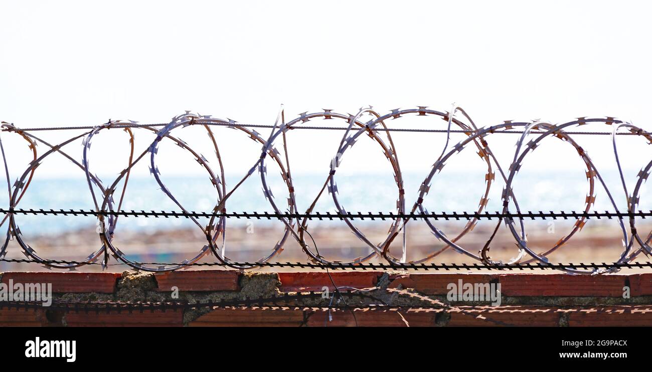Barbed wire with concertinas hires stock photography and images Alamy