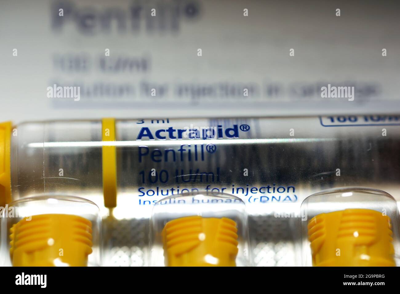 Actrapid human insulin rDNA penfill 100 IU solution for subcutaneous or intravenous injection in cartridge used in diabetic patients in IDDM patients Stock Photo
