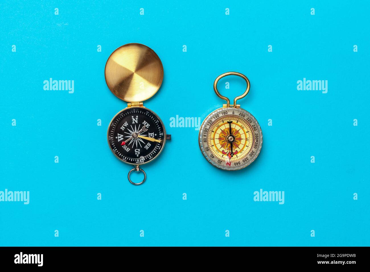 Compass on blue background, top view Stock Photo