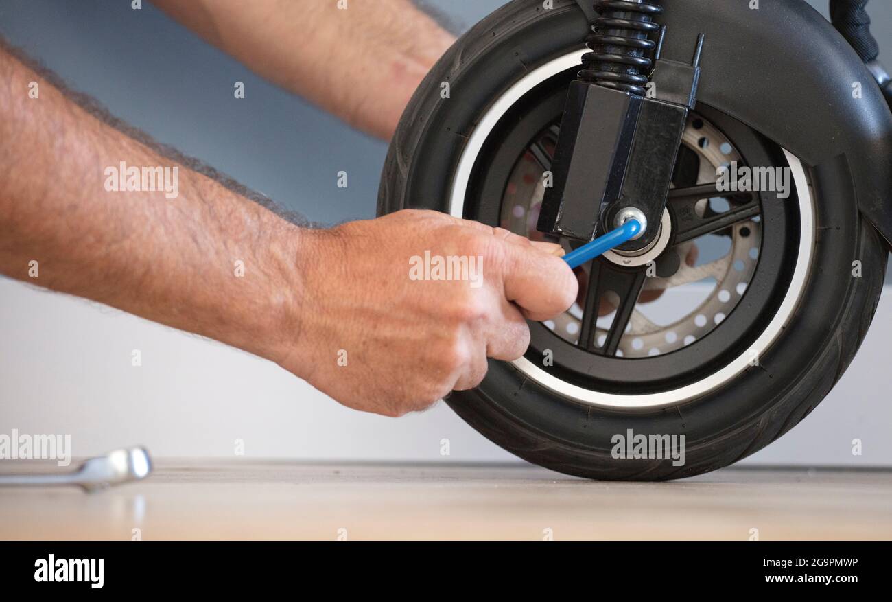 Electric scooter maintenance service concept. Repair service