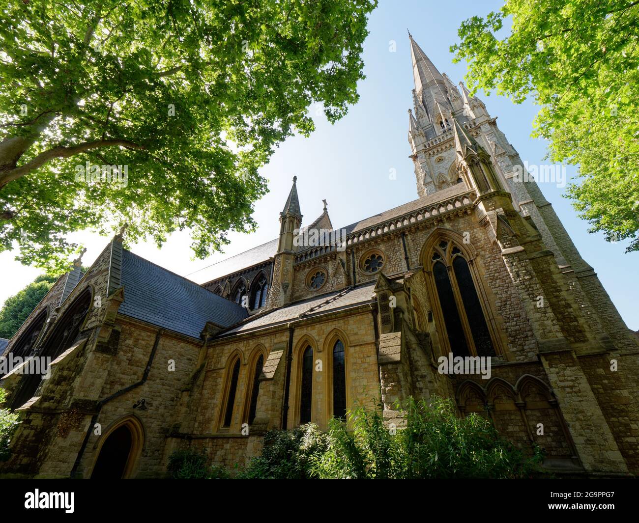 London, Greater London, England, July 17 2021: St Mary Abbot's church on the corner of High Street Kensington and Kensington Church Street. Stock Photo