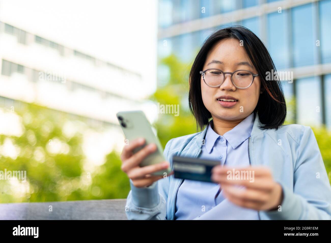 Professional using Fin Tech to make mobile transaction Stock Photo