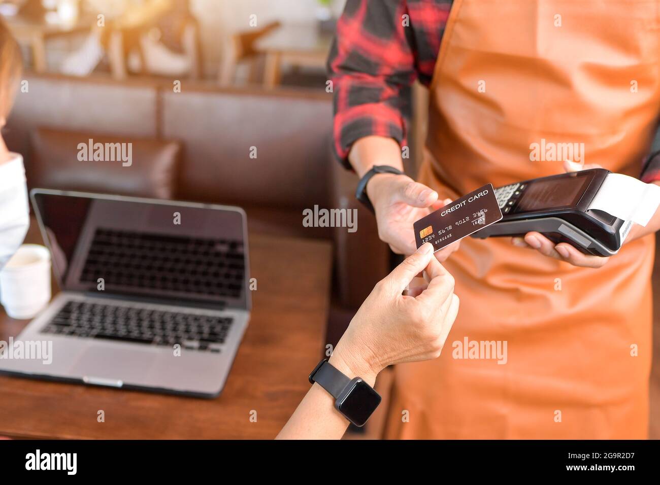 Mockup Credit card machine for money transaction payment.Moment of payment with a credit card through terminal.vintage style Stock Photo