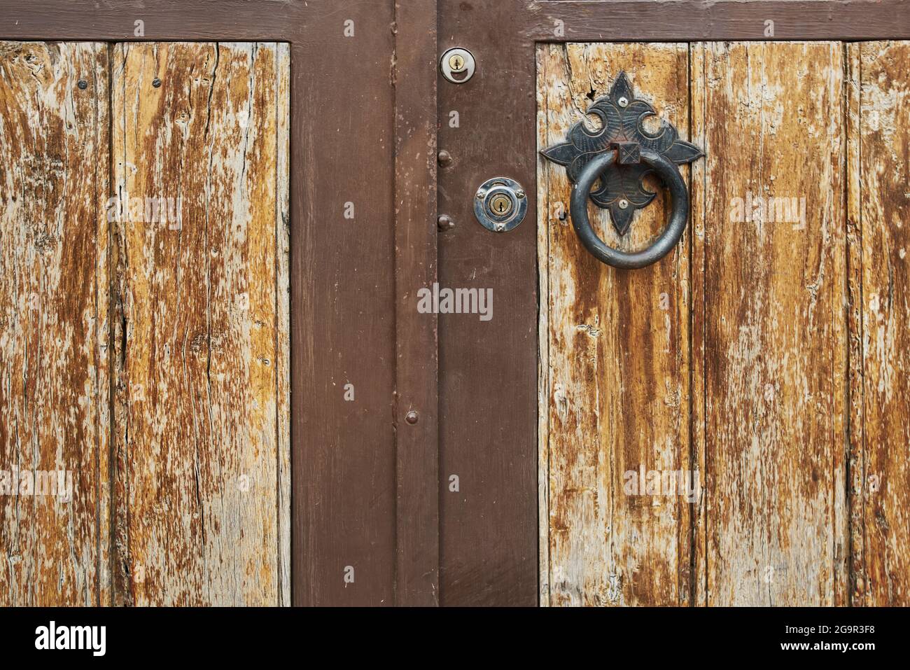 Antique wooden door with rusted hardware Stock Photo Alamy
