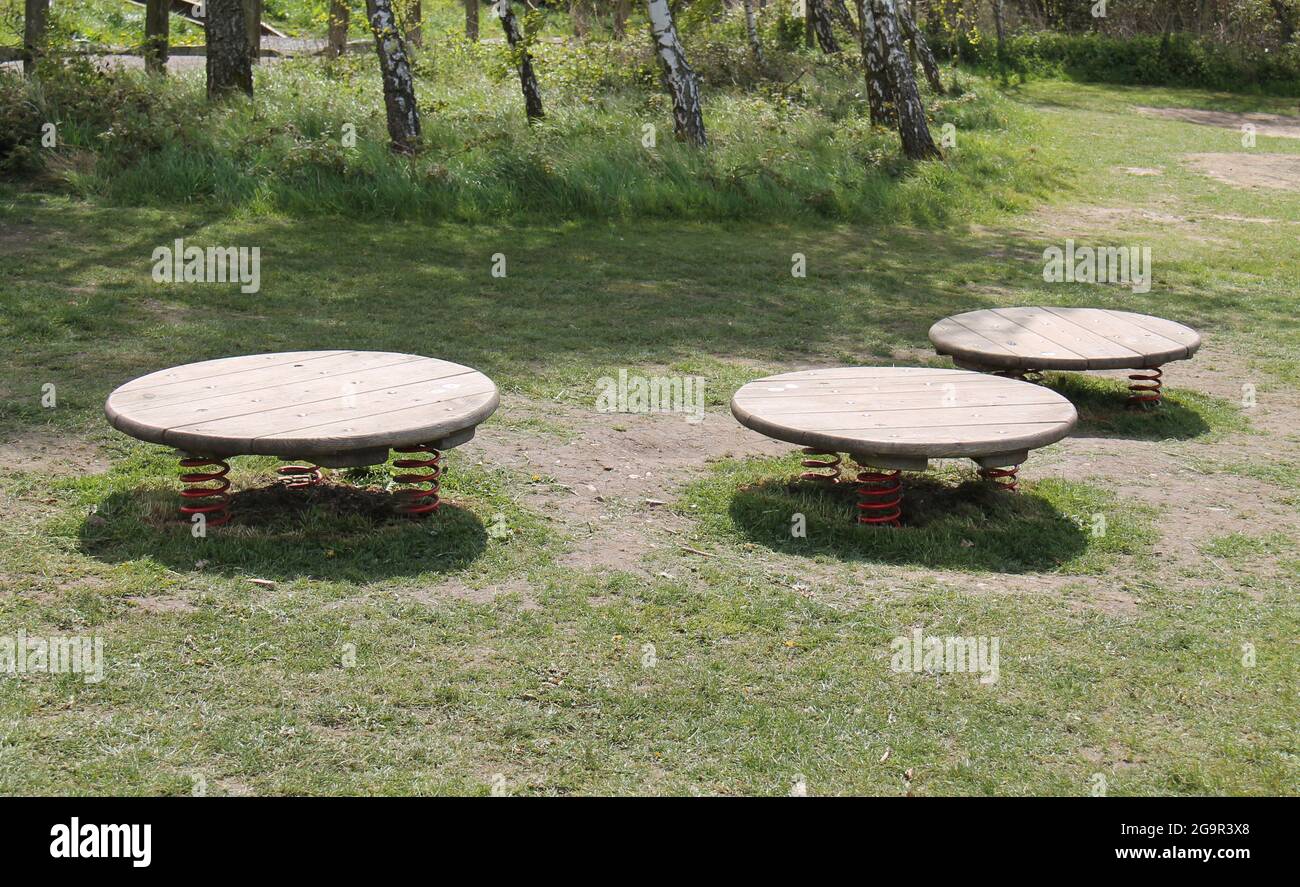 Three Balance Boards on Springs in a Playground Area Stock Photo Alamy