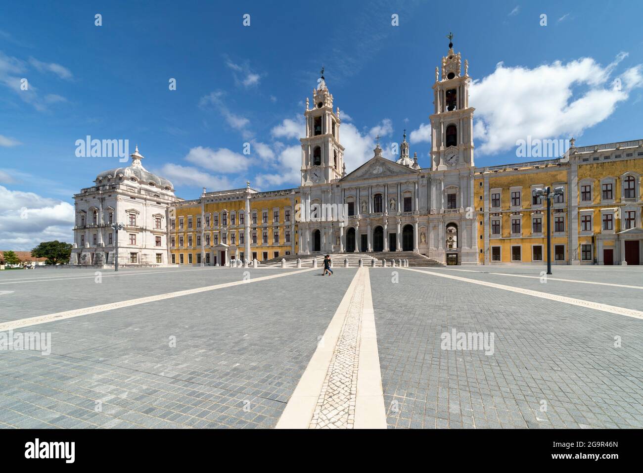 The main facade of The Palace of Mafra, Lisbon district, Portugal.  It is also known as the Palace-Convent of Mafra and the Royal Building of Mafra. Stock Photo