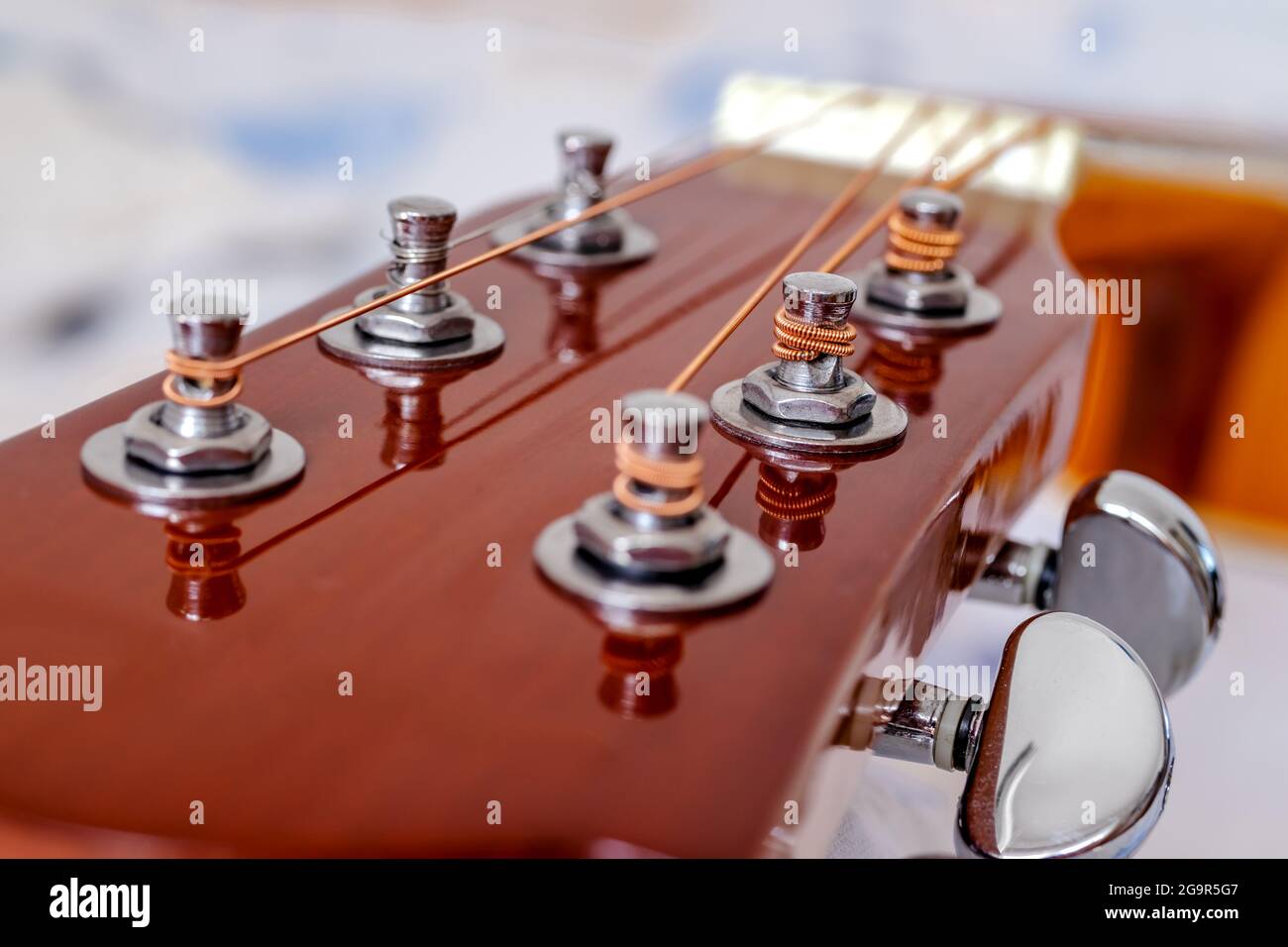 Guitar head with tuning heads. Musical instruments and music art