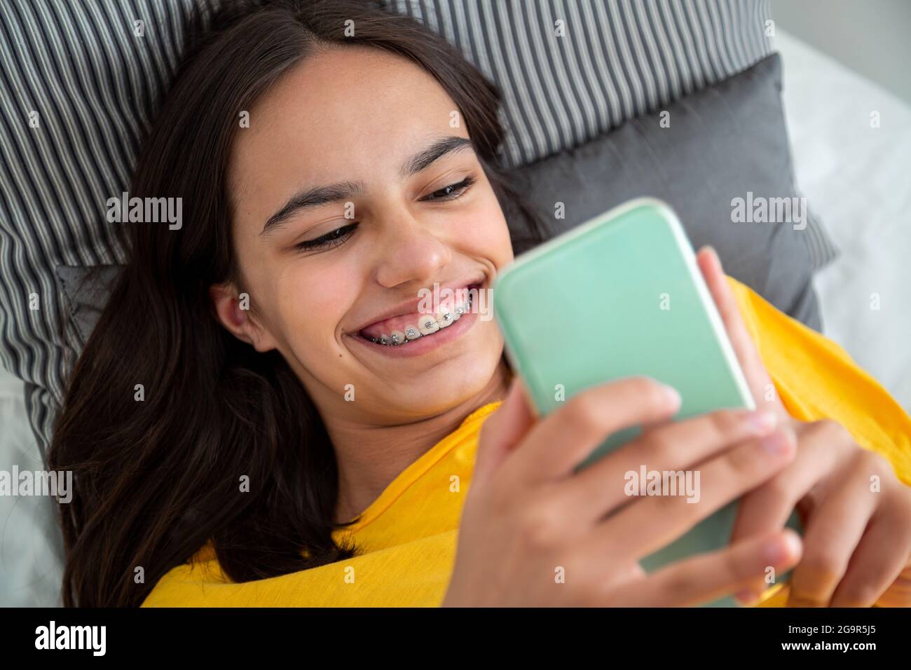 Teen girl with braces hi-res stock photography and images - Alamy