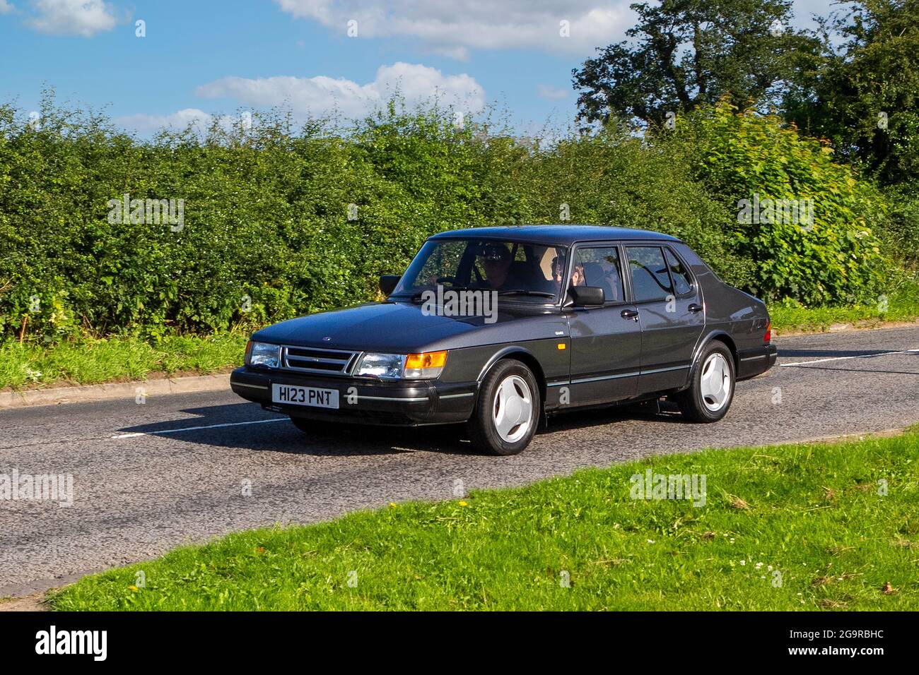 1990 90s SAAB I16 convertible vehicle en-route to Capesthorne Hall classic July car show, Cheshire, UK Stock Photo