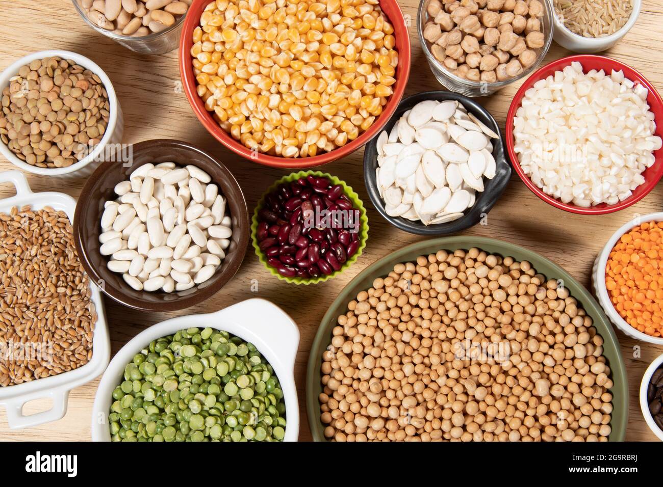 Collection of different cereal varieties and edible dry seeds. Examples