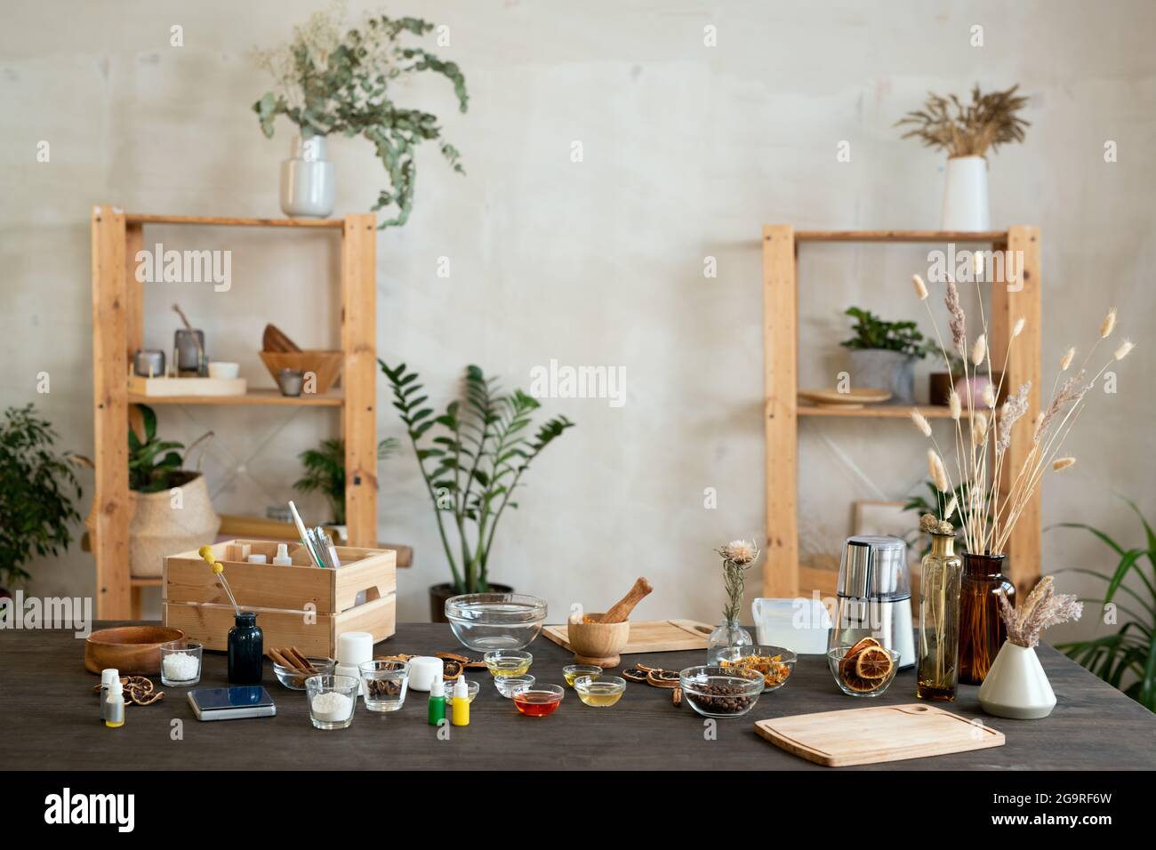 Interior of workplace with ingredients for making natural cosmetic products Stock Photo