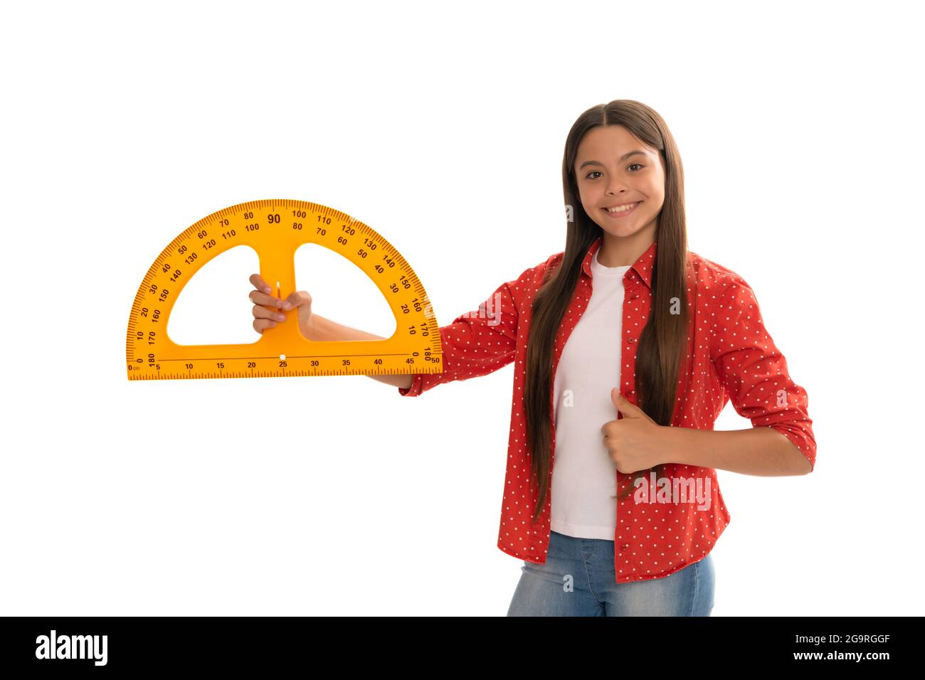 happy child hold protractor study mathematics at school showing thumb up, back to school. Stock Photo