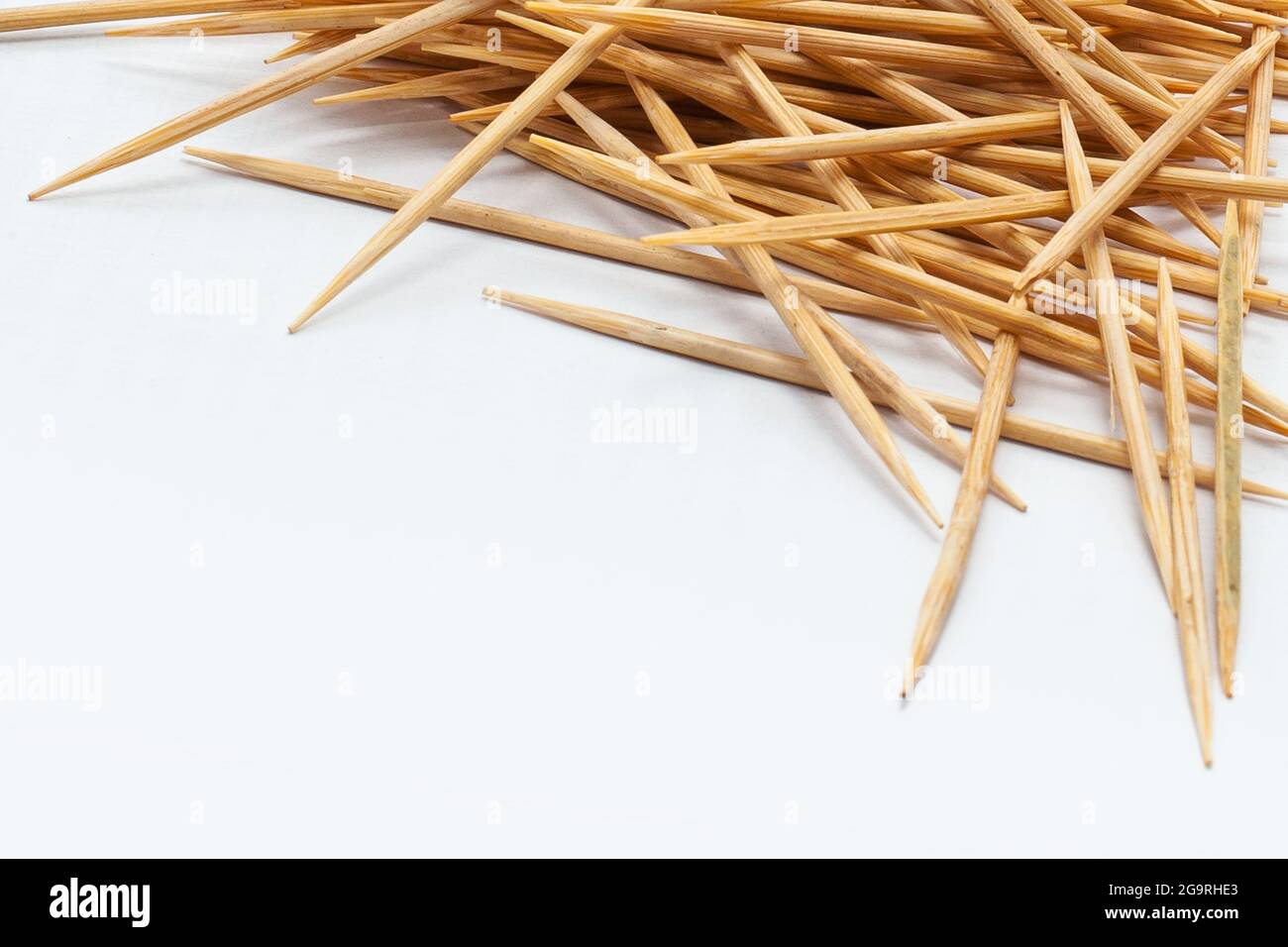 wooden toothpicks on a white isolated background Stock Photo - Alamy