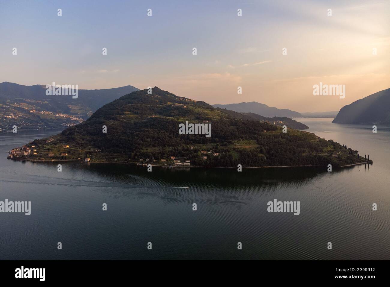 Aerial panoramic view of Lake Iseo and Monte Isola at sunset, Lombardy, Italy Stock Photo