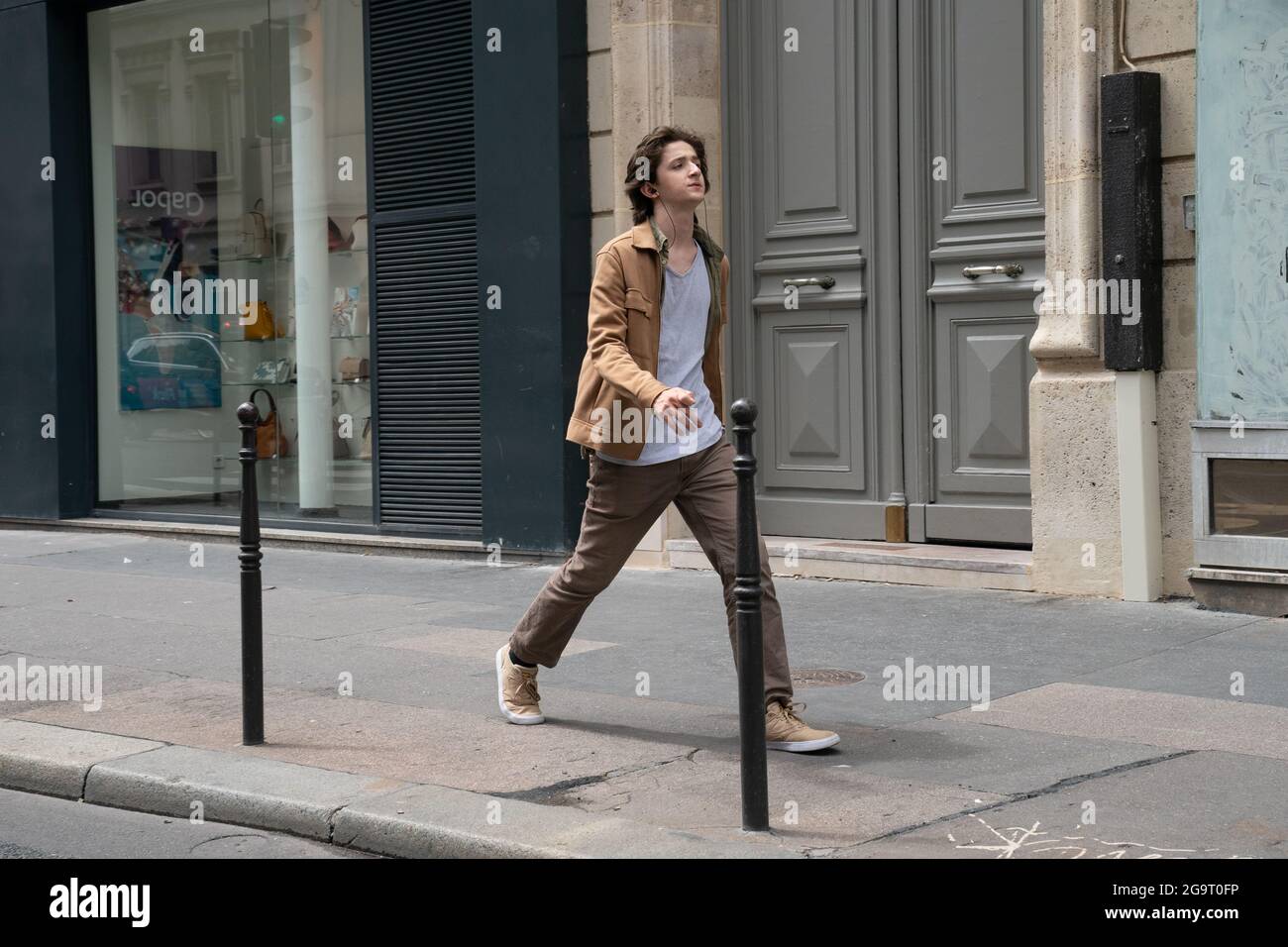 Unidentified random Parisian people and locations in the streets of