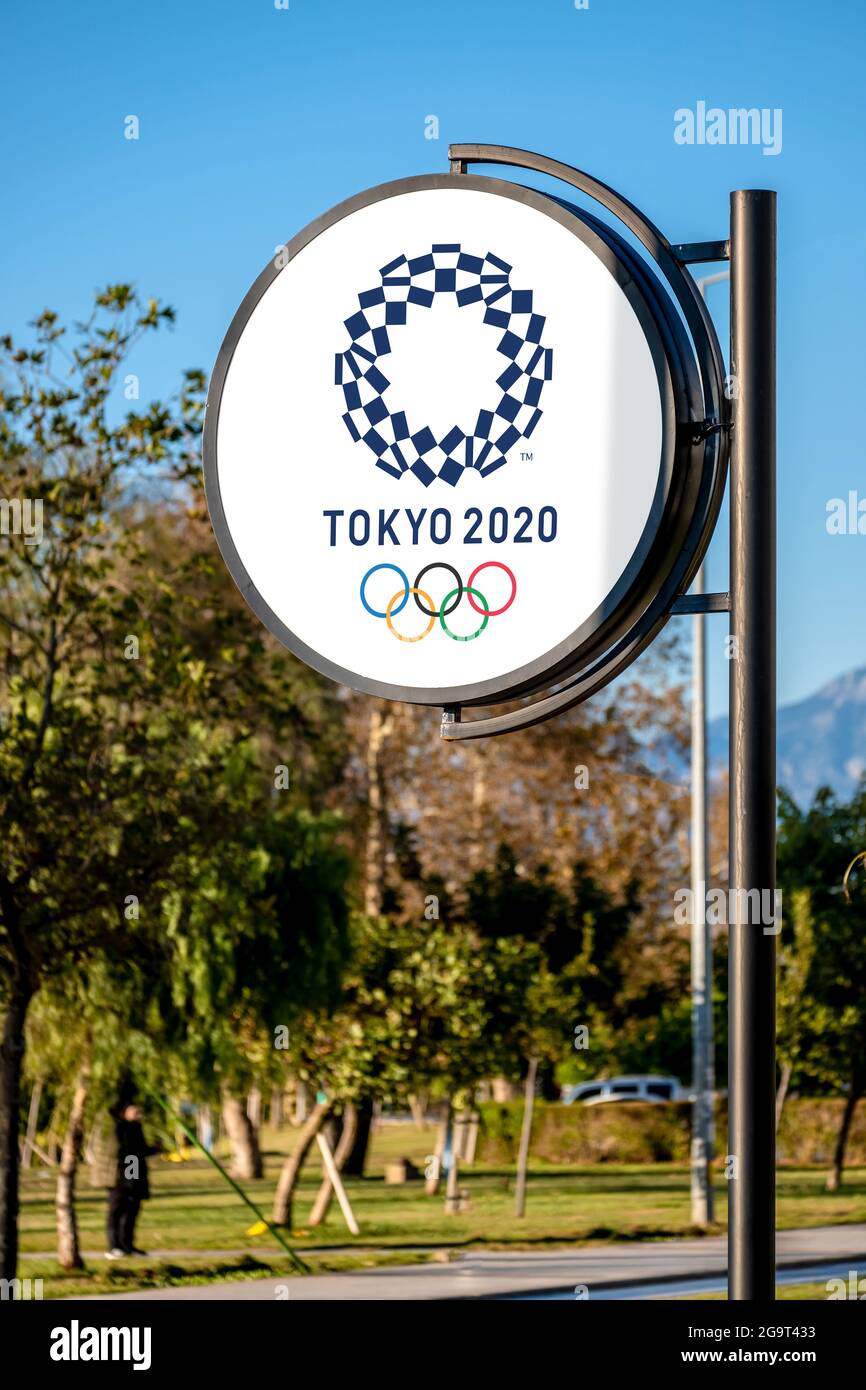 Antalya, Turkey - July 23, 2021: Official logo of the Tokyo 2020 Summer Olympic Games on the billboard from July 24 to August 09, 2020 Stock Photo