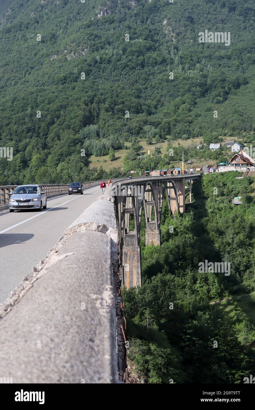 Djurdjevica Tara, Montenegro - July 17, 2021 Amazing old arc bridge in the mountains. One of the highest automobile bridges in Europe Stock Photo