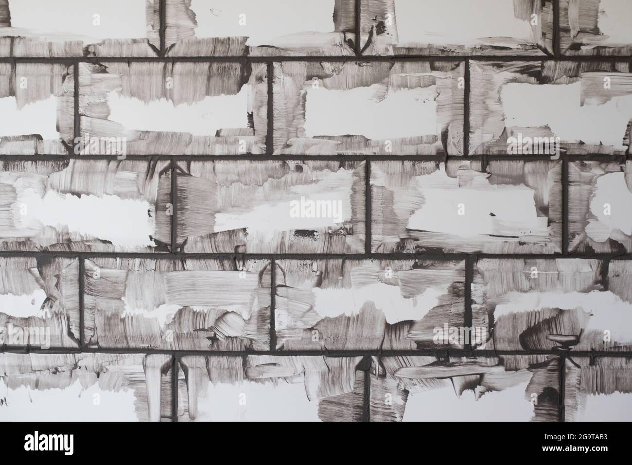 New white tiles with grey grouting at kitchen wall. Stock Photo