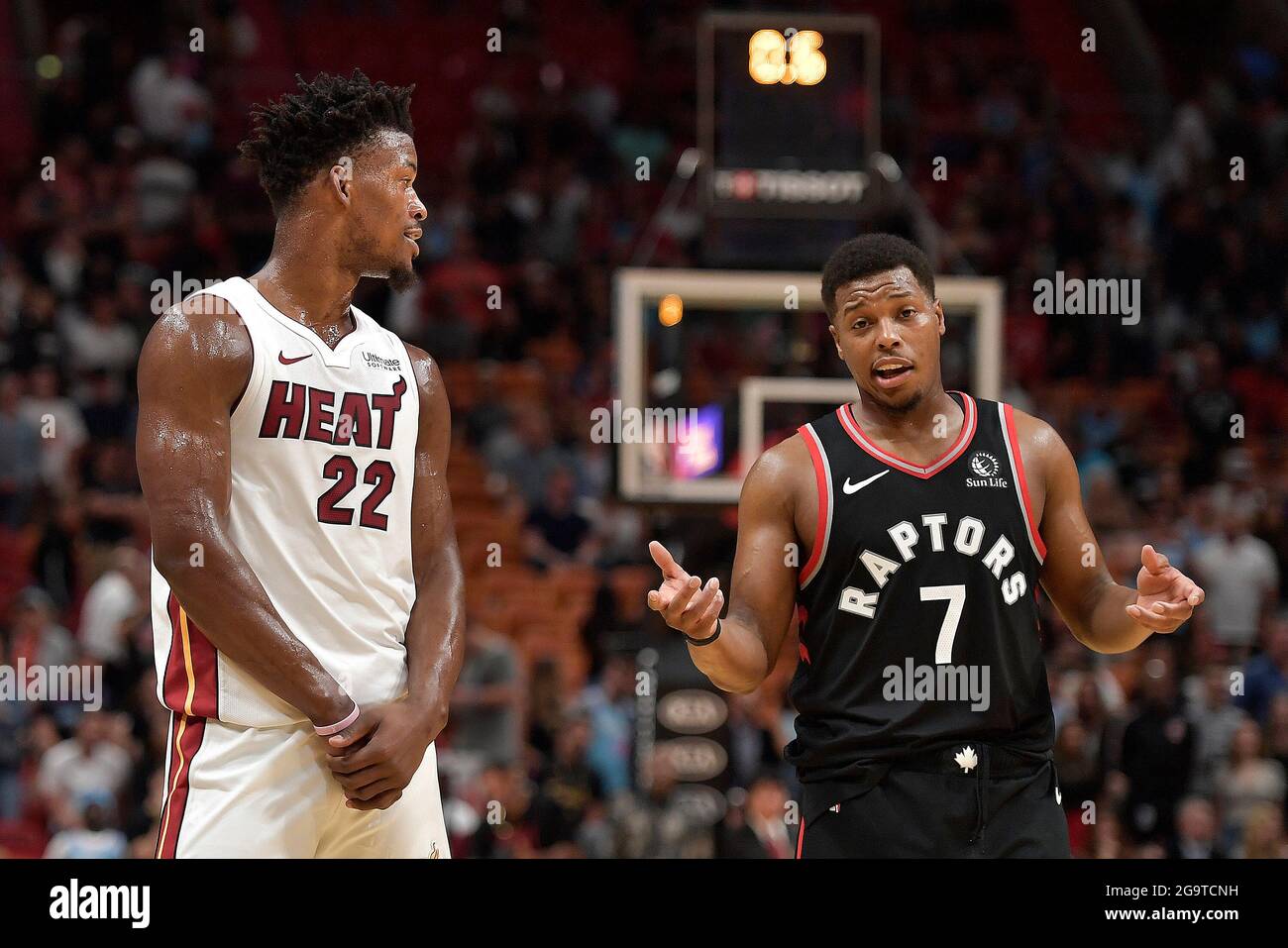 Miami, United States. 02nd Jan, 2020. Miami Heat's Jimmy Butler shares stories with Toronto Raptors Kyle Lowry during the second half of their game, Thursday, January 2, 2020, at AmericanAirlines Arena in Miami, Florida. (Photo by Michael Laughlin/South Florida Sun Sentinel/TNS/Sipa USA) Credit: Sipa USA/Alamy Live News Stock Photo