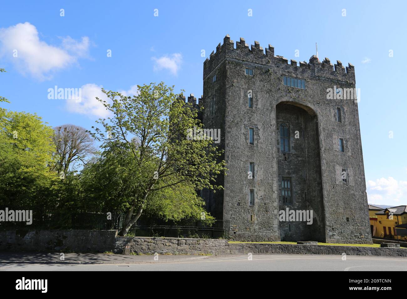 Beautiful shot of the Bunratty Castle in Bunratty, Ireland, surrounded by trees Stock Photo