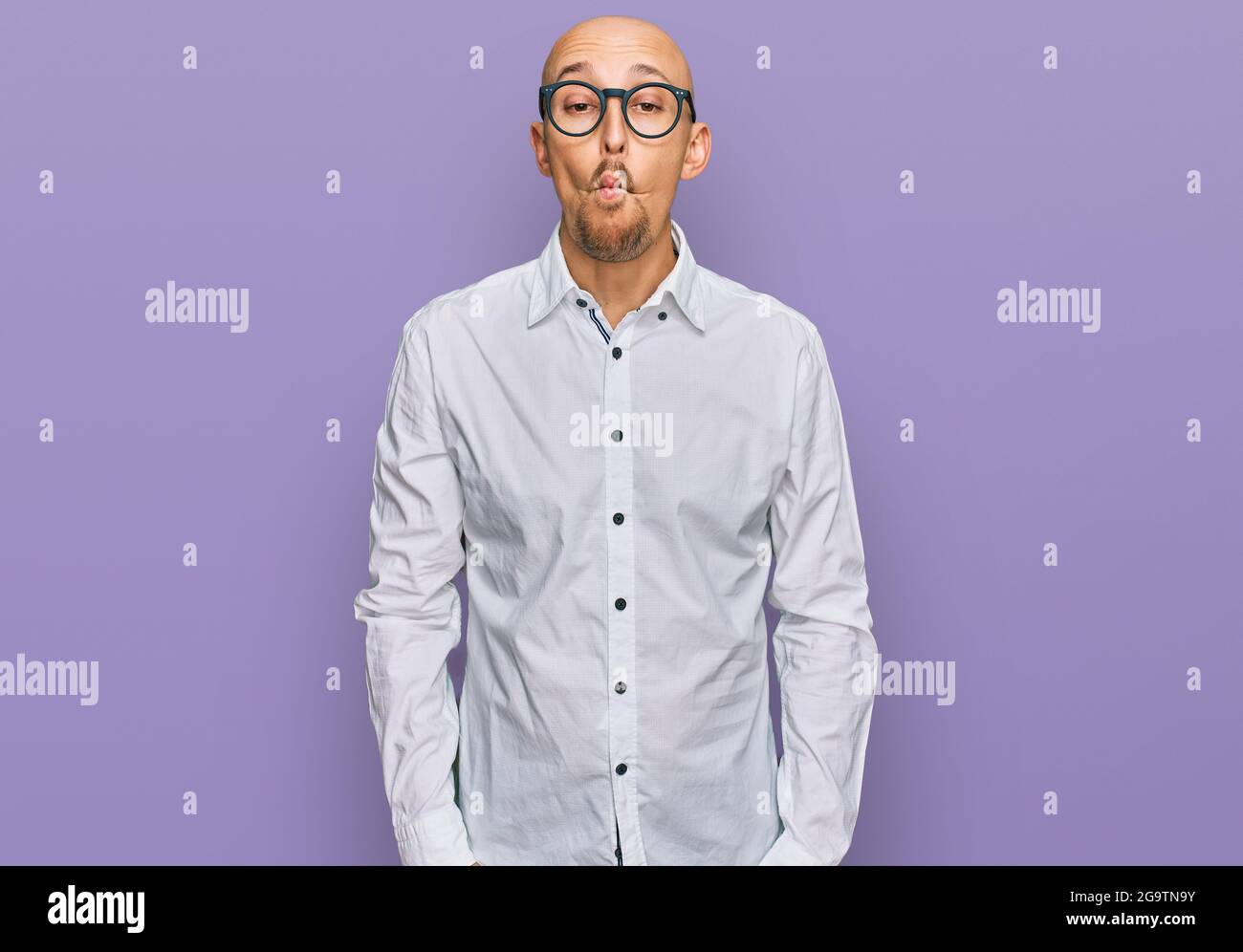 Bald man making funny face hi-res stock photography and images - Alamy