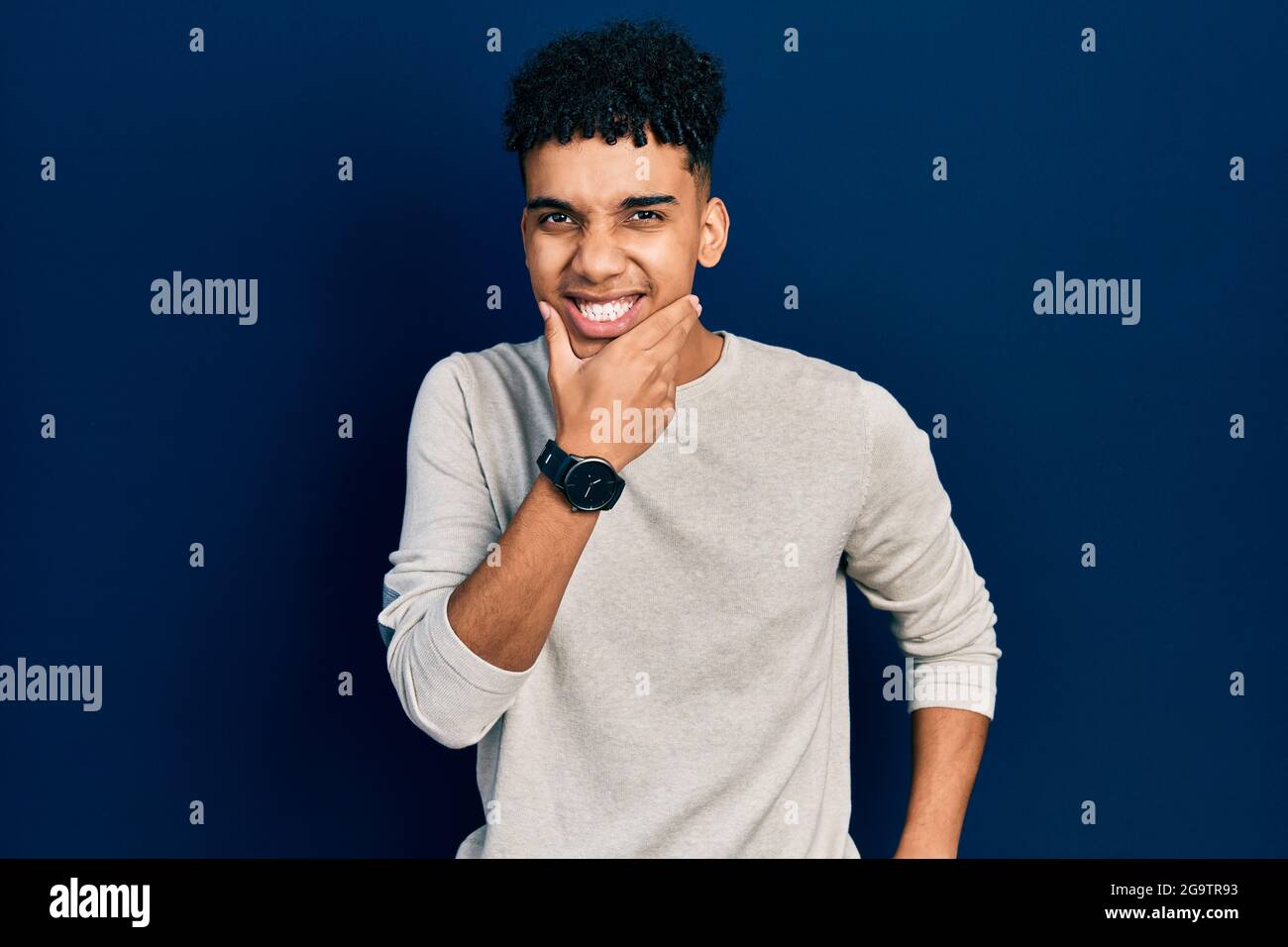 Young african american man wearing casual clothes looking confident at ...