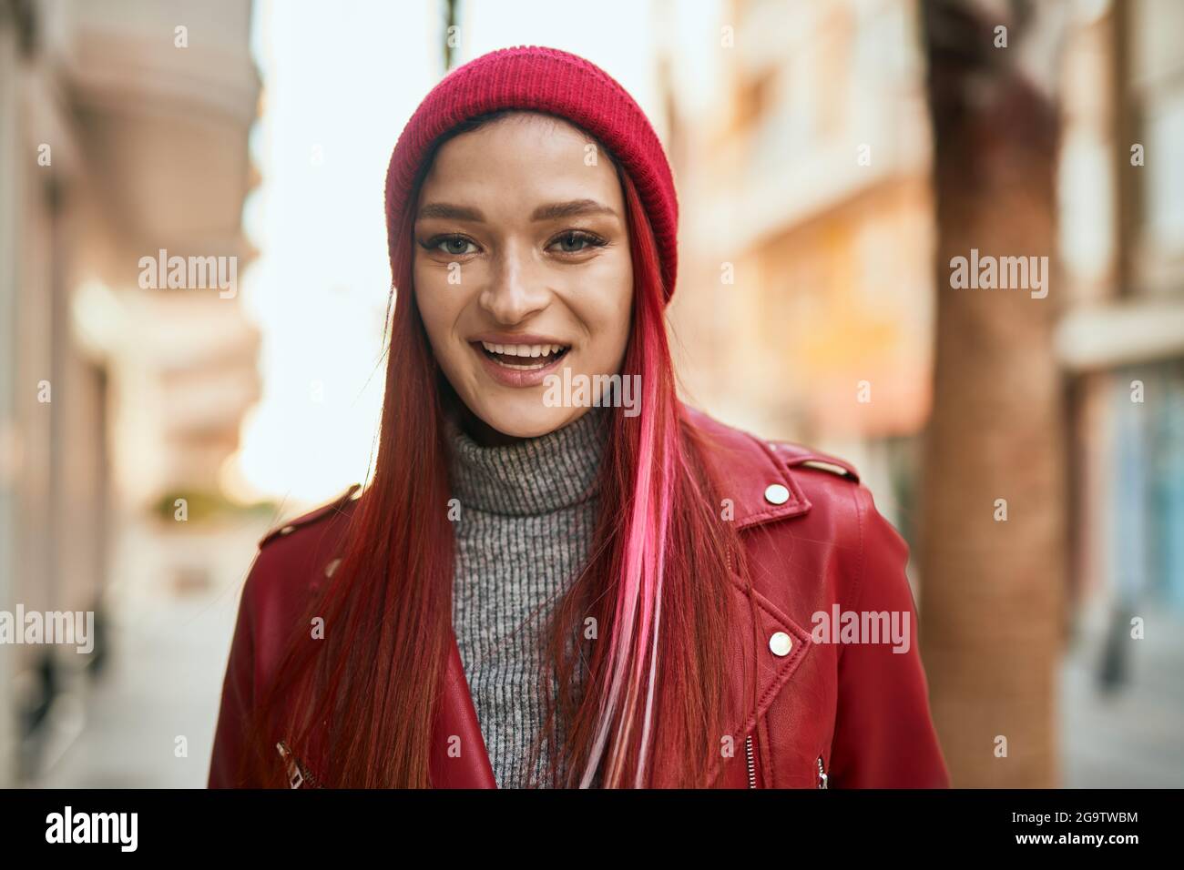 Young caucasian girl smiling happy standing at the city Stock Photo - Alamy