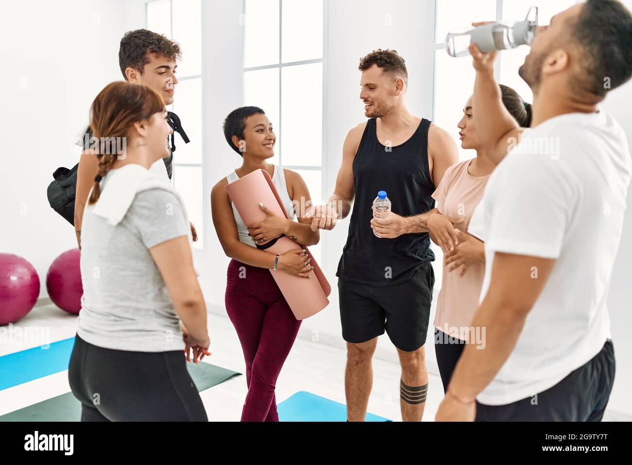 Group young sporty women talking hi-res stock photography and images ...