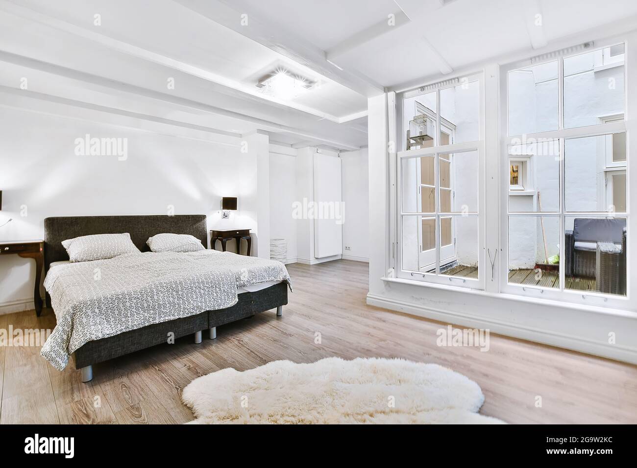 Interior of a cozy and bright bedroom with beautiful decoration Stock ...