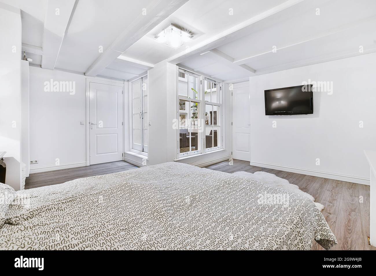 Interior of a cozy and bright bedroom with beautiful decoration Stock ...