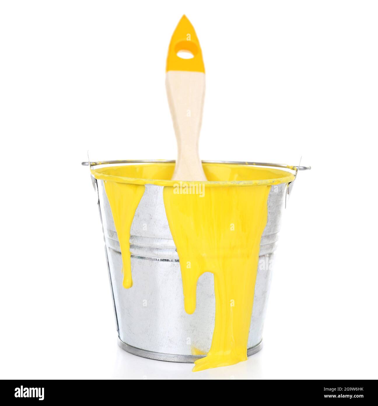 Bucket of yellow paint with brush isolated on white Stock Photo Alamy