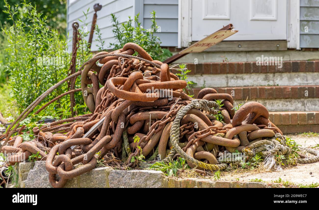 a pile of large rusting chains Stock Photo