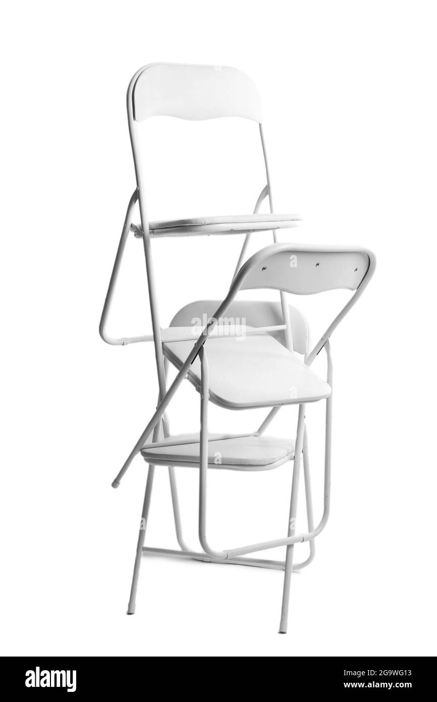 Stack of metal chairs isolated on white Stock Photo Alamy