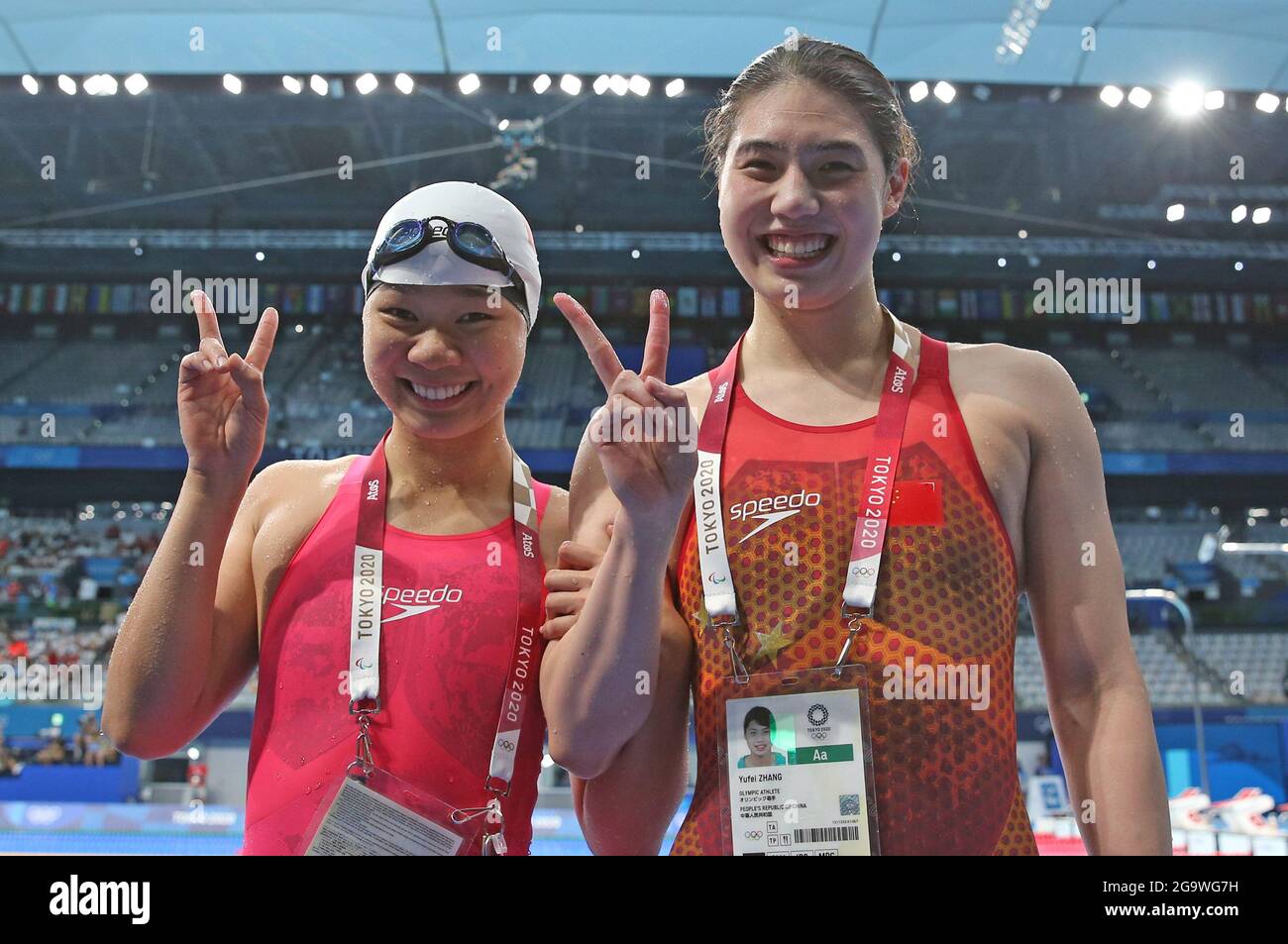 Tokyo, Japan. 28th July, 2021. Zhang Yufei (R) and Yu Liyan of China pose after the women's 200m butterfly semifinal at the Tokyo 2020 Olympic Games in Tokyo, Japan, July 28, 2021. Credit: Ding Xu/Xinhua/Alamy Live News Stock Photo