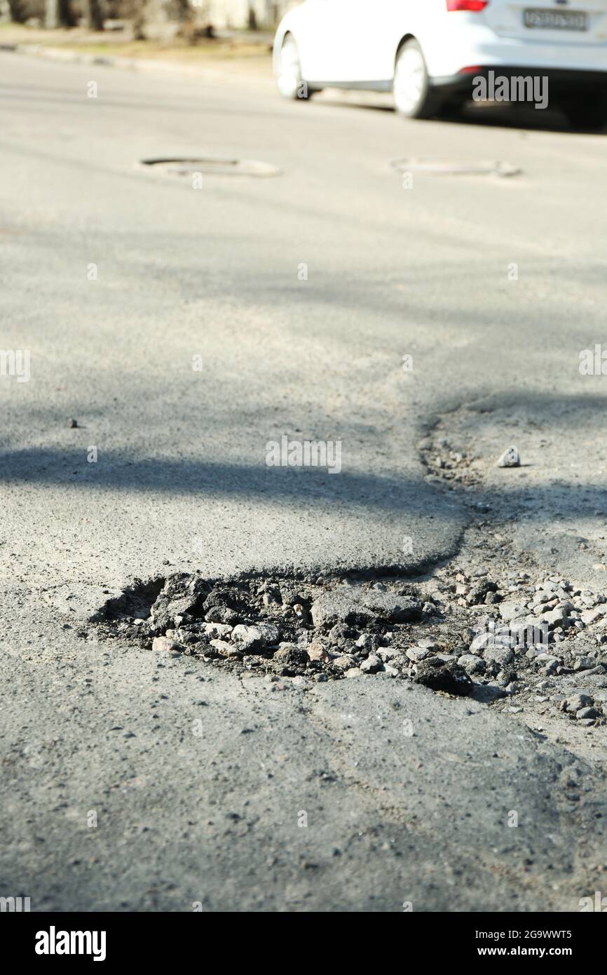 Very bad quality road with potholes Stock Photo Alamy