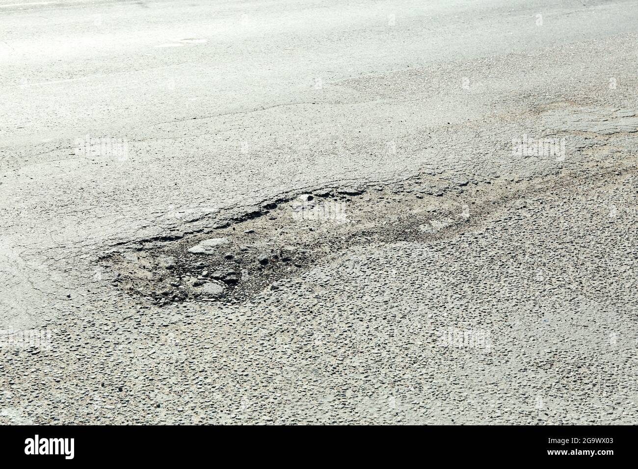 Very bad quality road with potholes Stock Photo Alamy