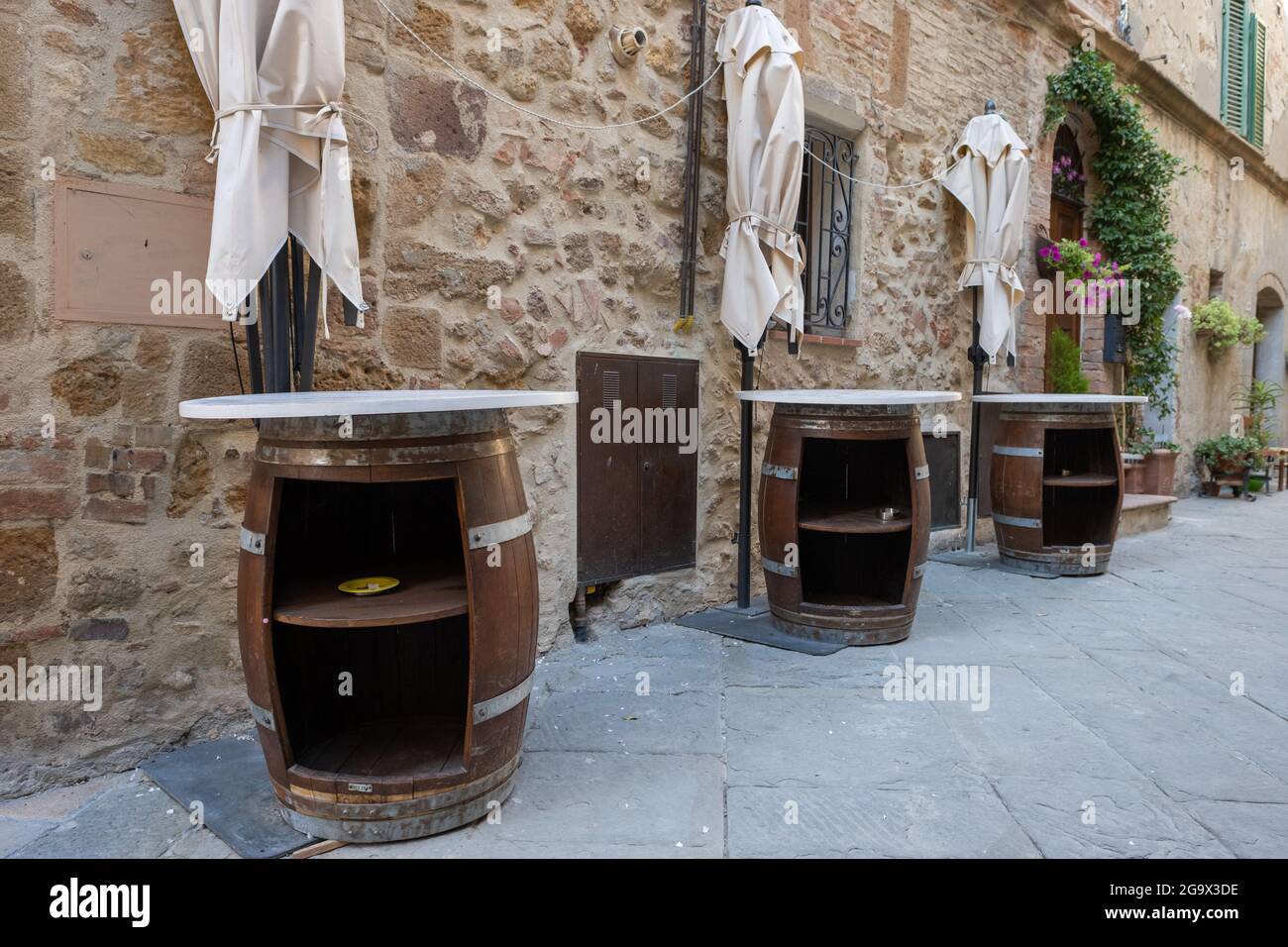 Wooden wine barrel on the street bar restaurant Stock Photo