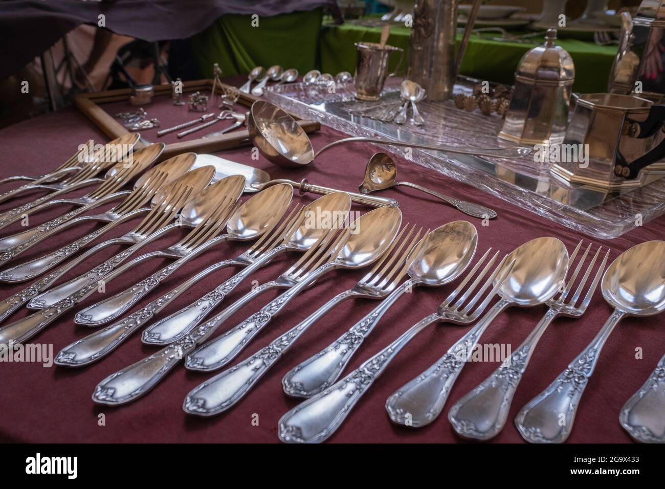 Silver cutlery at the flea market Arezzo Italy Stock Photo